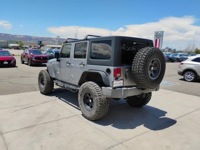 used 2015 Jeep Wrangler Unlimited car, priced at $18,329
