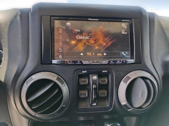 used 2015 Jeep Wrangler Unlimited car, priced at $18,329