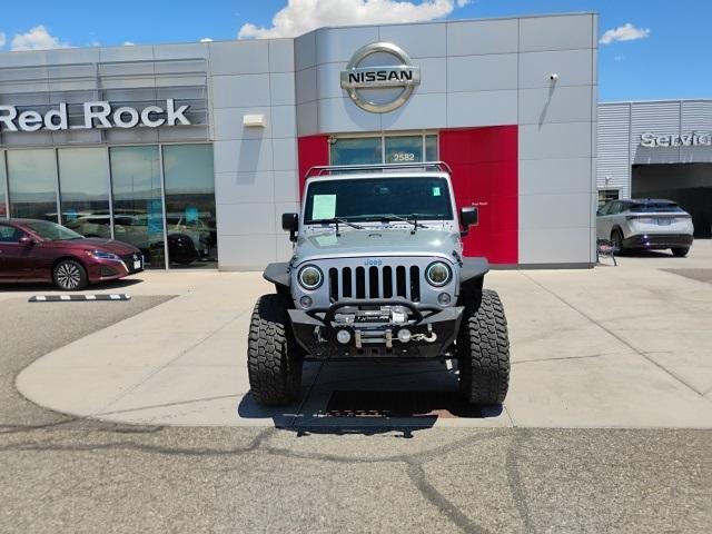 used 2015 Jeep Wrangler Unlimited car, priced at $18,329