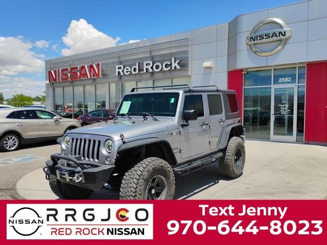used 2015 Jeep Wrangler Unlimited car, priced at $18,329