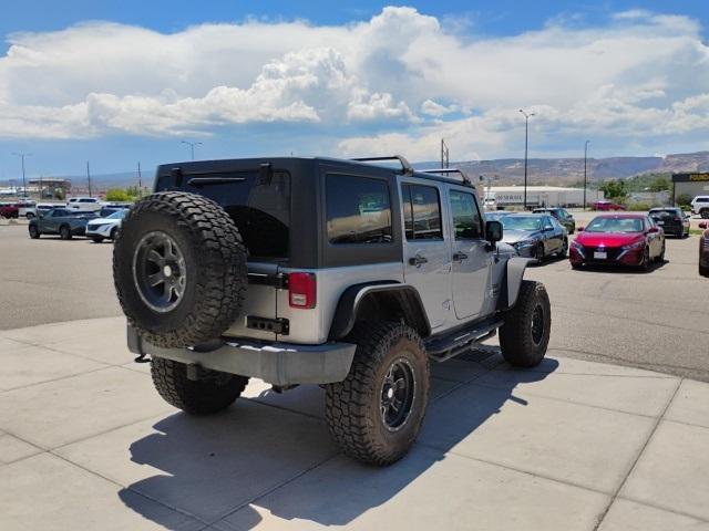 used 2015 Jeep Wrangler Unlimited car, priced at $18,329