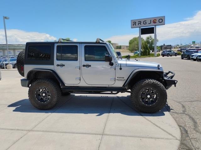 used 2015 Jeep Wrangler Unlimited car, priced at $18,329