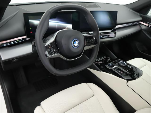 used 2024 BMW i5 car, priced at $56,900