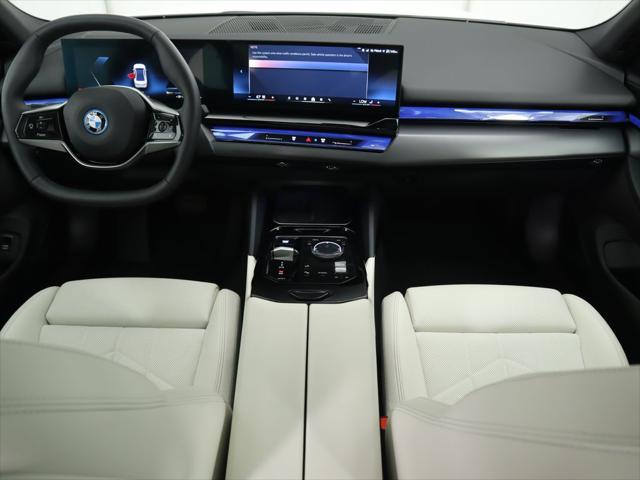 used 2024 BMW i5 car, priced at $56,900