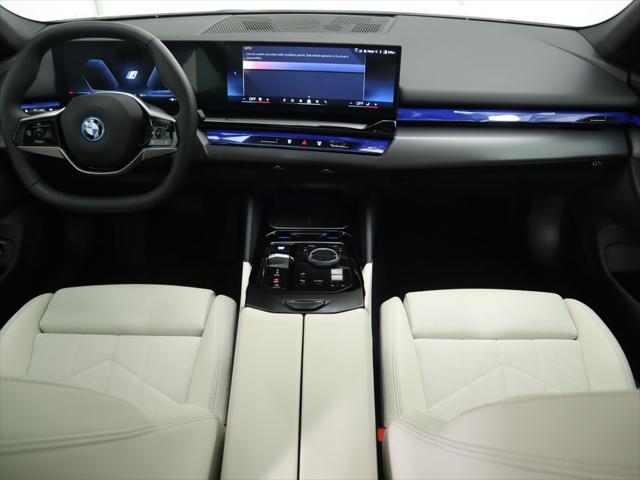 used 2024 BMW i5 car, priced at $51,900