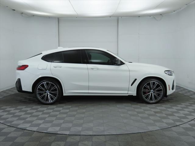 used 2023 BMW X4 car, priced at $54,900