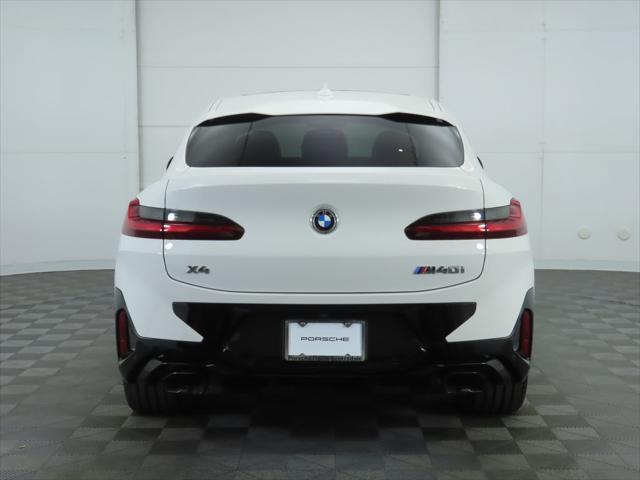 used 2023 BMW X4 car, priced at $54,900