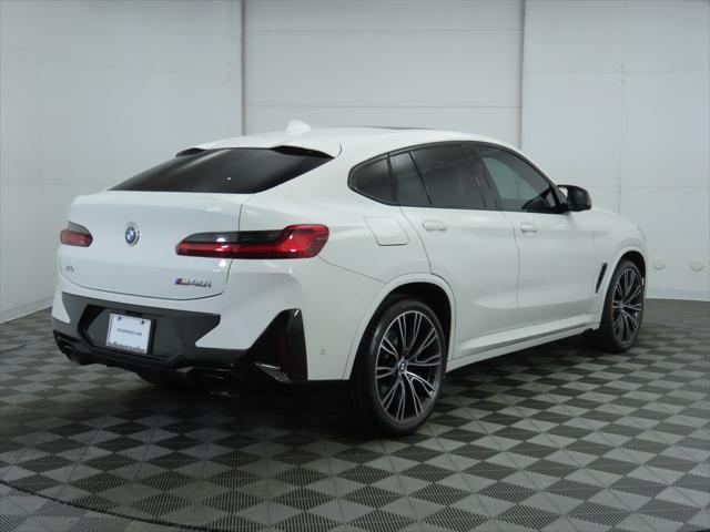 used 2023 BMW X4 car, priced at $54,900