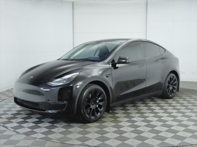 used 2023 Tesla Model Y car, priced at $29,900