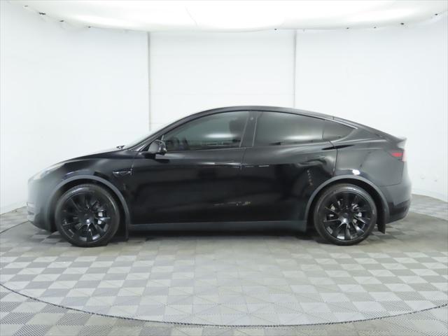 used 2023 Tesla Model Y car, priced at $29,900