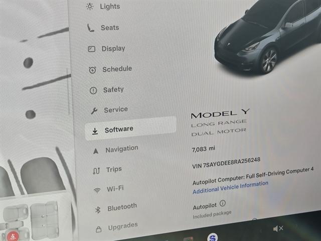 used 2024 Tesla Model Y car, priced at $35,950