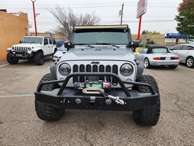 used 2015 Jeep Wrangler Unlimited car, priced at $23,950