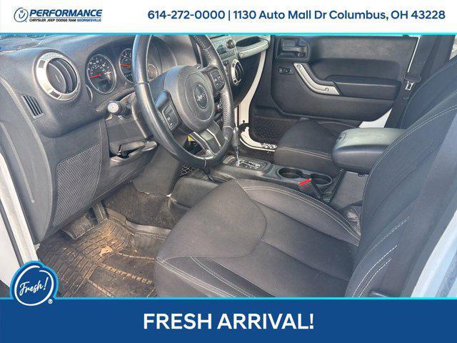 used 2018 Jeep Wrangler JK Unlimited car, priced at $17,631