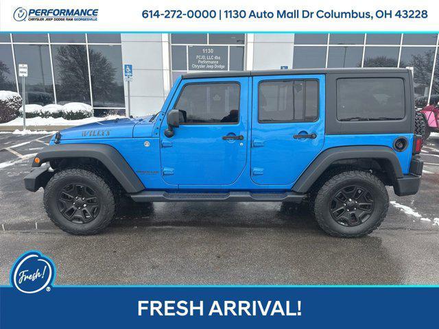 used 2015 Jeep Wrangler Unlimited car, priced at $14,899