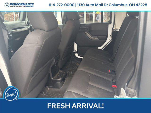 used 2015 Jeep Wrangler Unlimited car, priced at $14,996