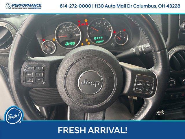 used 2015 Jeep Wrangler Unlimited car, priced at $14,996