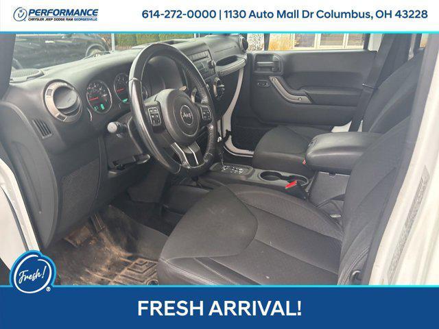used 2015 Jeep Wrangler Unlimited car, priced at $14,996