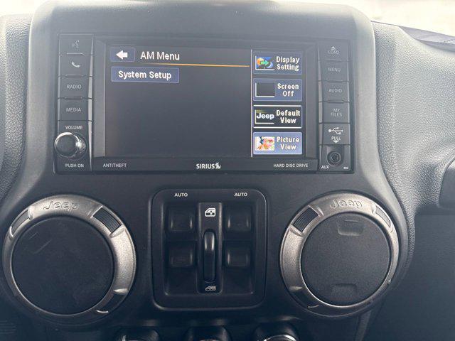 used 2014 Jeep Wrangler Unlimited car, priced at $11,297