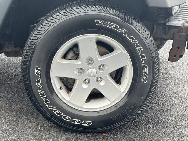 used 2014 Jeep Wrangler Unlimited car, priced at $11,297