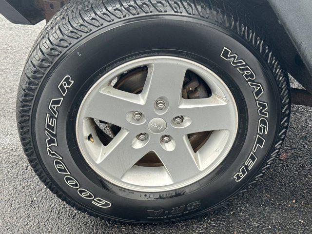 used 2014 Jeep Wrangler Unlimited car, priced at $11,297