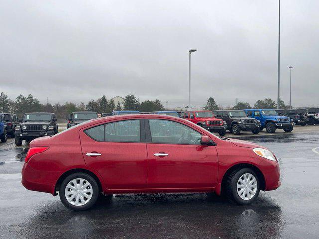 used 2012 Nissan Versa car, priced at $4,900