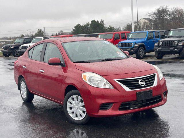 used 2012 Nissan Versa car, priced at $4,900