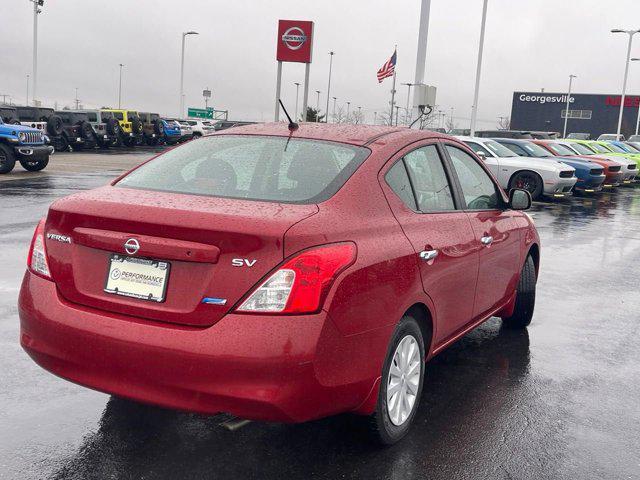 used 2012 Nissan Versa car, priced at $4,900