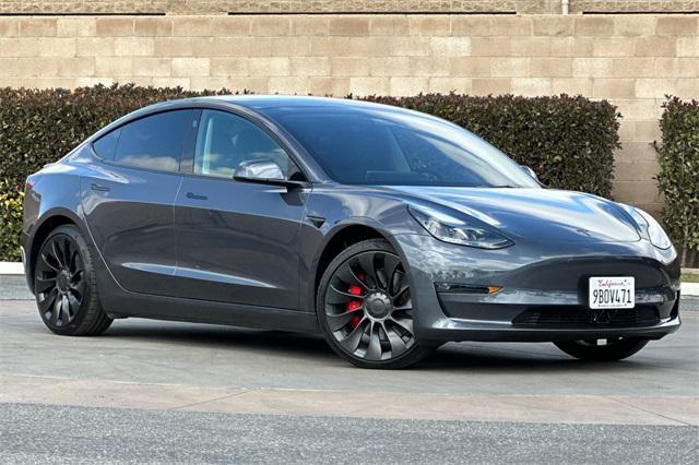 used 2022 Tesla Model 3 car, priced at $33,555