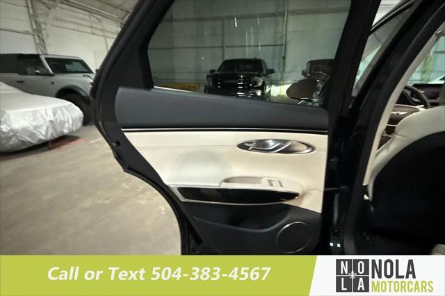used 2022 Genesis GV70 car, priced at $34,900
