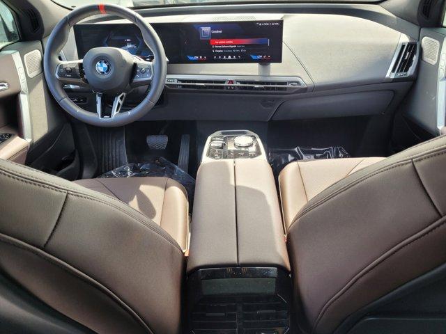 used 2025 BMW iX car, priced at $83,594