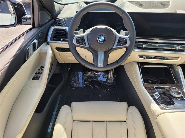 used 2025 BMW X6 car, priced at $78,662