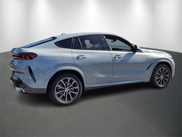 used 2025 BMW X6 car, priced at $78,662