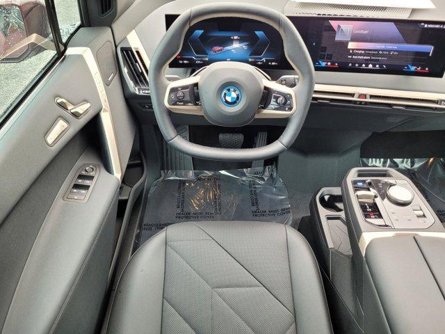 new 2024 BMW iX car, priced at $97,795
