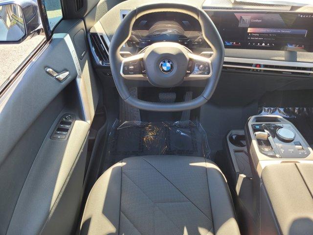 new 2026 BMW iX car, priced at $83,620