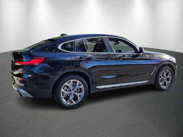 used 2023 BMW X4 car, priced at $46,905