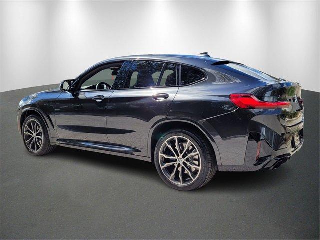 used 2023 BMW X4 car, priced at $64,100