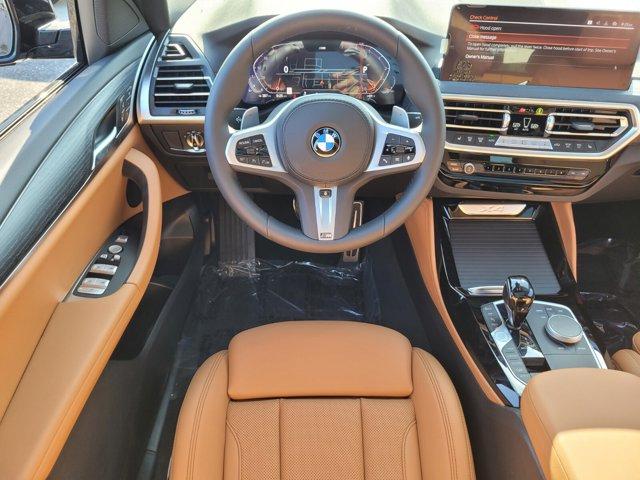 new 2025 BMW X4 car, priced at $62,825