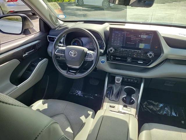 used 2021 Toyota Highlander Hybrid car, priced at $30,245