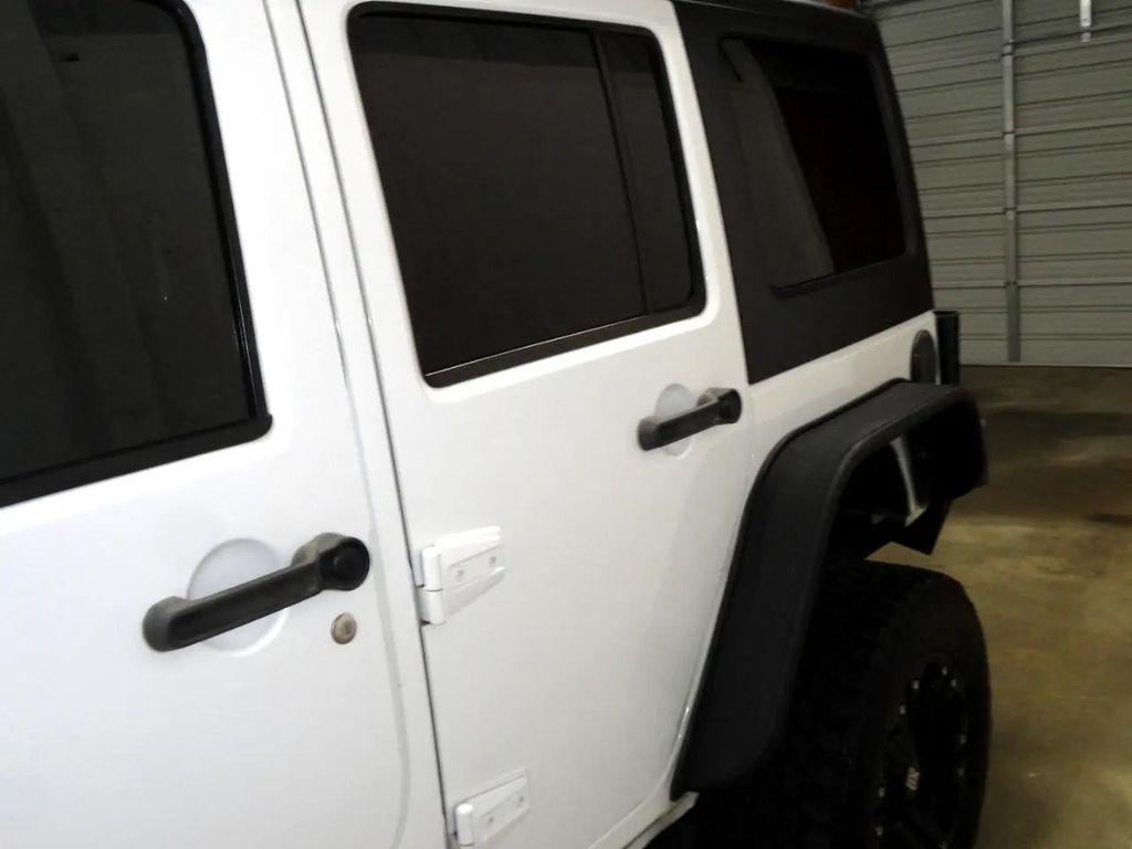 used 2013 Jeep Wrangler Unlimited car, priced at $15,995