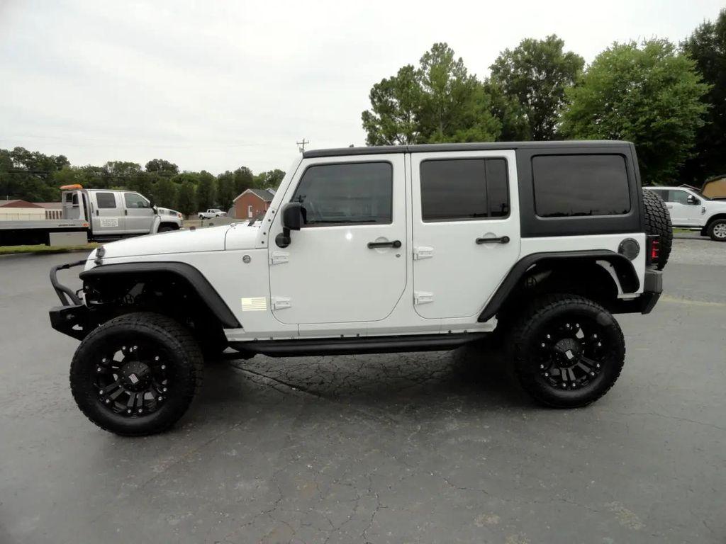 used 2013 Jeep Wrangler Unlimited car, priced at $15,995