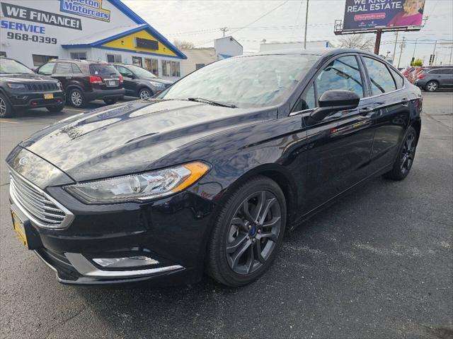 used 2018 Ford Fusion car, priced at $15,495