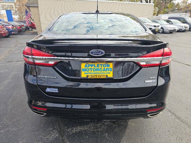 used 2018 Ford Fusion car, priced at $15,495