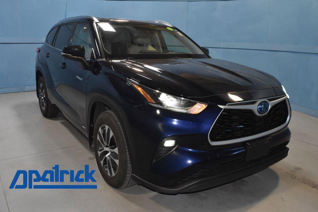 used 2021 Toyota Highlander Hybrid car, priced at $28,830