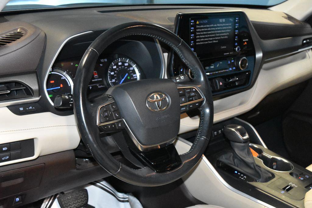 used 2021 Toyota Highlander Hybrid car, priced at $29,990