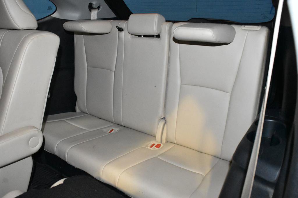 used 2021 Toyota Highlander Hybrid car, priced at $29,990