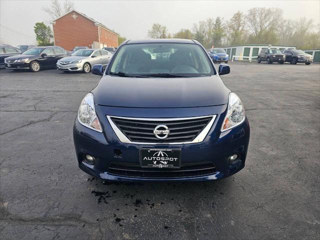 used 2014 Nissan Versa car, priced at $7,999