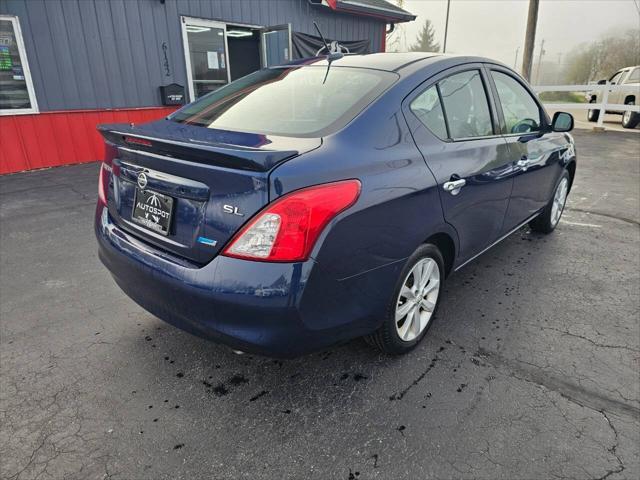 used 2014 Nissan Versa car, priced at $7,999
