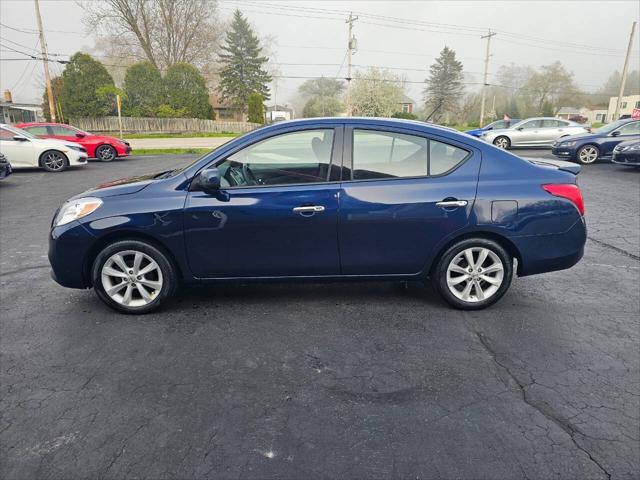 used 2014 Nissan Versa car, priced at $7,999