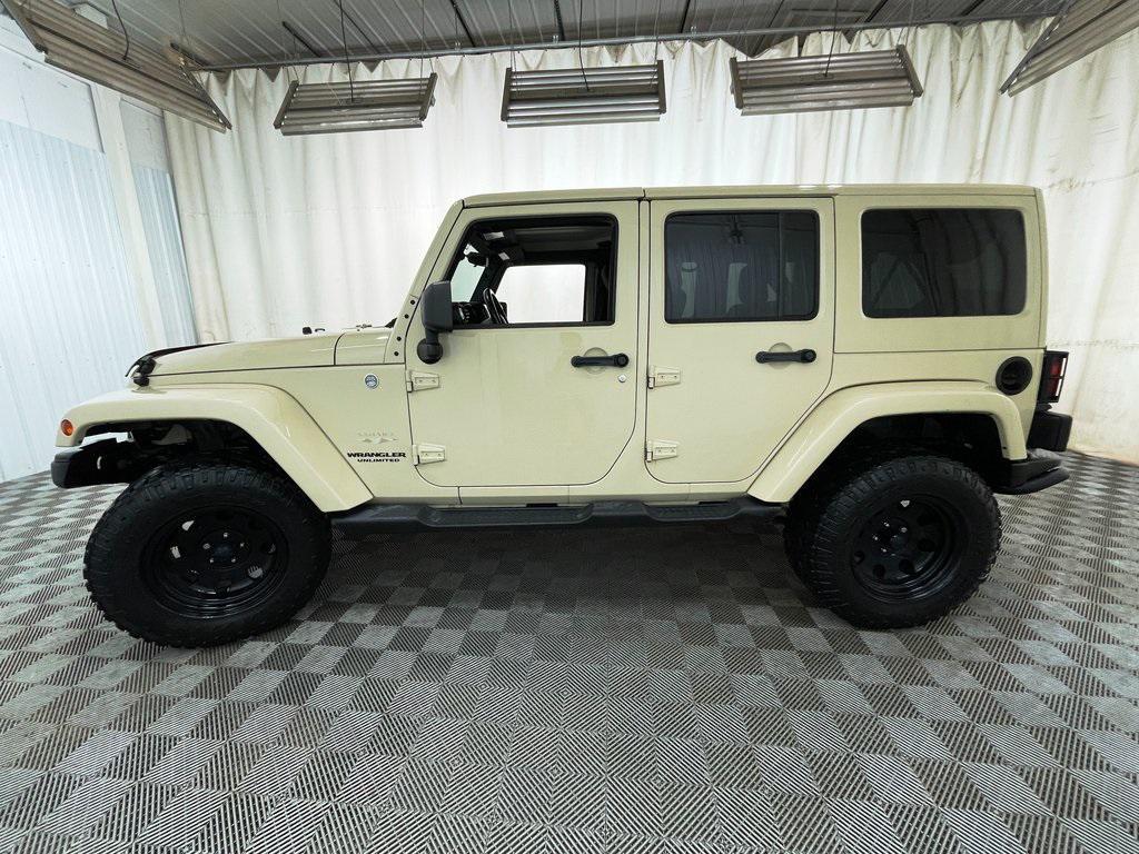 used 2011 Jeep Wrangler Unlimited car, priced at $12,999