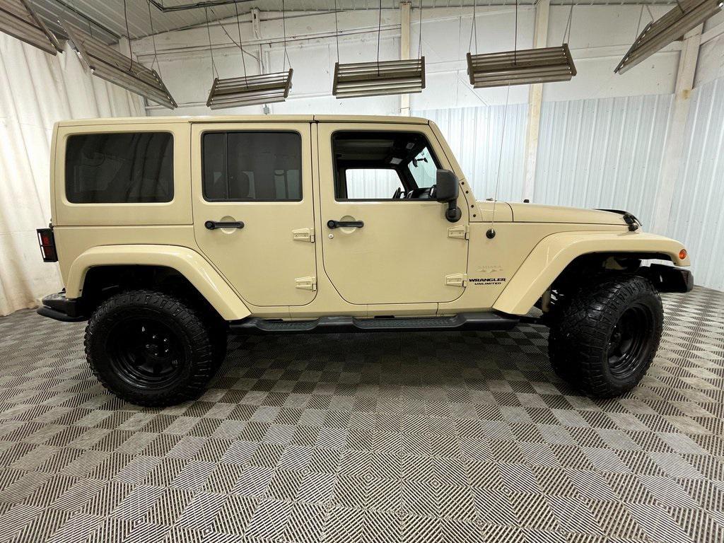 used 2011 Jeep Wrangler Unlimited car, priced at $12,999